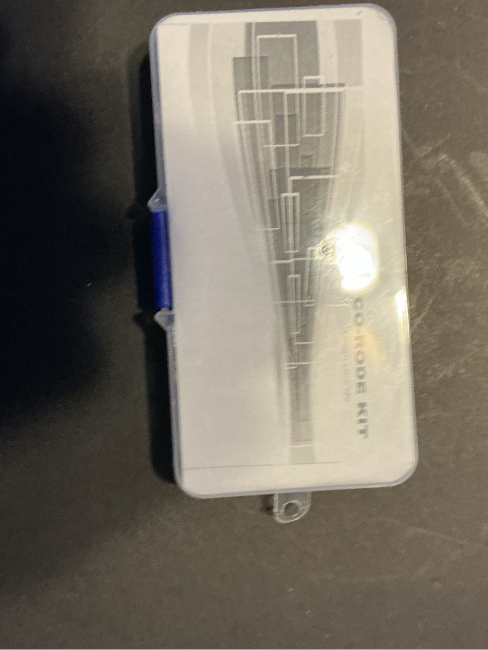 Compact White Electronics Storage Case with Blue Latch
